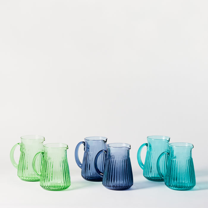 Six Assorted Small Jugs