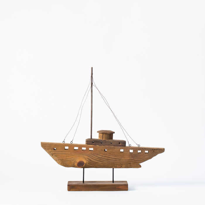 Small Antiqued  Boat on Plinth