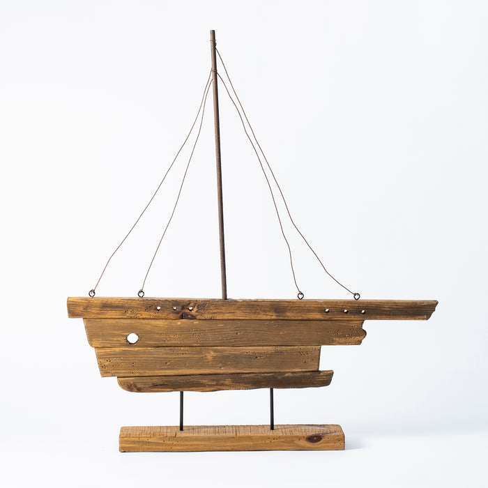 Large Antiqued Boat on Plinth